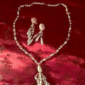 Necklace with matching clipped earrings.